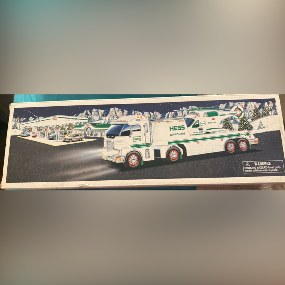 Hess toy truck and helicopter unopened in box.